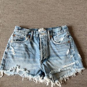 AGolde parker light washed distressed jean shorts. Size 26